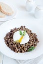 Lentil and soft poached egg Royalty Free Stock Photo