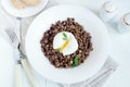Lentil and soft poached egg Royalty Free Stock Photo