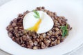 Lentil and soft poached egg Royalty Free Stock Photo