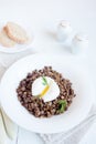 Lentil and soft poached egg Royalty Free Stock Photo