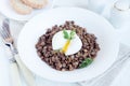 Lentil and soft poached egg Royalty Free Stock Photo