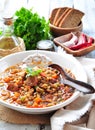 Lentil soup with chicken and pepperoni sausage, onion, carrot, sweet pepper, garlic and parsley. Royalty Free Stock Photo