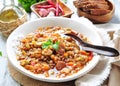 Lentil soup with chicken and pepperoni sausage, onion, carrot, sweet pepper, garlic and parsley. Royalty Free Stock Photo