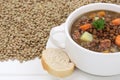 Lentil soup stew with many lentils and vegetables closeup