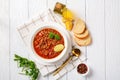 Lentil soup with vegetables and lemon wedges Royalty Free Stock Photo