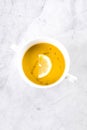 Lentil soup in the white bowl on marble table. Top view Royalty Free Stock Photo