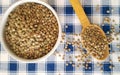 Lentils in ceramic bowl and spoon Royalty Free Stock Photo