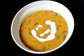 Pumpkin Lentils soup with cream garnishing Royalty Free Stock Photo