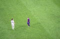 Leo Messi of FC Barcelona and David Luiz of PSG in action