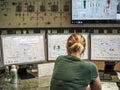 LEOBEN, AUSTRIA - 05/22/2019: Woman in front of control panels in Goss Brewery