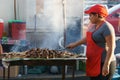 Leon, Leon, Nicaragua - March 10, 2018: Nicaraguan women cooking on the street typical food