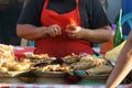 Leon, Leon, Nicaragua - March 10, 2018: Nicaraguan women cooking on the street typical food