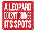 A LEOPARD DOESN`T CHANGE ITS SPOTS, words on red stamp sign