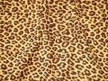 Leopard effect, fabric pattern, background sample. Leopard print seamless background. Royalty Free Stock Photo