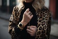 leopard-print jewelry paired with a black outfit