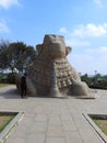 Closeup of beautiful huge or big Lord Shiva Vehicle Nandi, Basava in a blue sky background