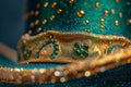 Leprechaun hat decorated with golden drops ribbon and smaragd cloves with horseshoes closeup. St. Patrick holiday