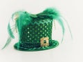 Leprechaun hat, green and gold with polka dots, feathers and beads, sparkly and shiny for St. PatrickÃ¢â¬â¢s Day