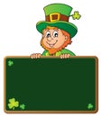 Leprechaun holding greenboard 1