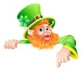 Leprechaun pointing down at sign