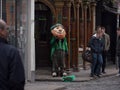 Leprechaun and tourists in Temple Bar, Dublin, Ireland Royalty Free Stock Photo