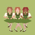 Three dancing leprechaun girls Royalty Free Stock Photo