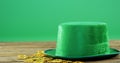 Leprechauns hat and gold on table for st patricks
