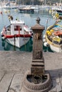 Water tap in the harbour in Lerici in Liguria Italy on April 21, 2019