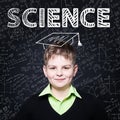 Lern Science. Clever student child on blackboard background Royalty Free Stock Photo