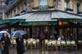 Les Deux Magots, the famous cafe and restaurant in Paris, France on a rainy day