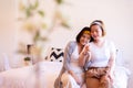 Lesbian asian woman hands holding together in the bedroom ,Happy and smiling,LGBT Royalty Free Stock Photo