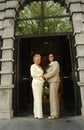 Lesbian brides in front of town hall Royalty Free Stock Photo