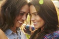 Lesbian couple embrace outdoors look to each other, close up Royalty Free Stock Photo