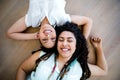 Lesbian couple lying on floor Royalty Free Stock Photo