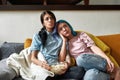 Lesbian couple watching soap opera on TV Royalty Free Stock Photo