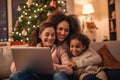 lesbian gay couple family with a child smiling in the living room having a good time the three together sitting on the couch sofa Royalty Free Stock Photo