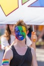 Lesbian Girl with painted Face at Christopher Street Day in Stuttgart, Germany