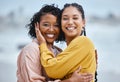 Lesbian, hug and portrait of couple of friends for lgbtq or queer love and freedom on vacation together at the beach Royalty Free Stock Photo