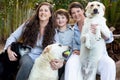Lesbian moms with a young boy. 3 Labrador dogs.