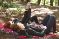 Lesbians lying in forest