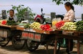 Leshan, China: Women Selling Produce