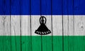 Lesotho Flag Over Wood Planks