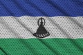 Lesotho flag printed on a polyester nylon sportswear mesh fabric