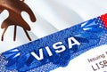 Lesotho Visa in passport. USA immigration Visa for Lesotho citizens focusing on word VISA. Travel Lesotho visa in national