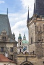 Lesser Town Bridge Tower in Prague. View of the Cathedral of St. Nicholas. Architecture of Prague Royalty Free Stock Photo