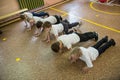 Lesson of physical education of children of elementary grades in Royalty Free Stock Photo