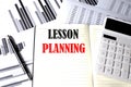 LESSON PLANNING text written on a notebook on chart and diagram Royalty Free Stock Photo