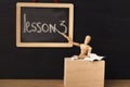 Lesson 3 written with chalk on blackboard. Royalty Free Stock Photo