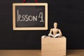 Lesson 4 written with chalk on blackboard. Royalty Free Stock Photo