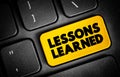 Lessons Learned text button on keyboard, concept background Royalty Free Stock Photo